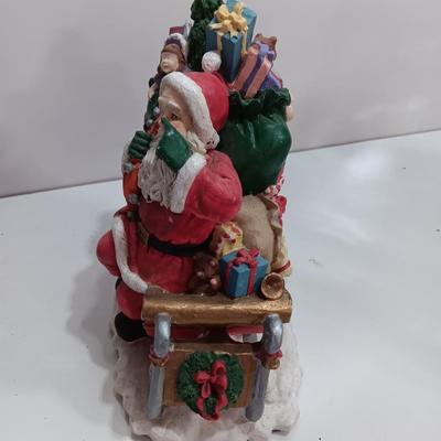 Santa figure with Sleigh full of toys