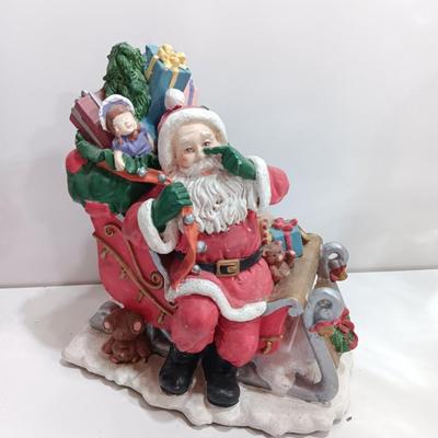 Santa figure with Sleigh full of toys