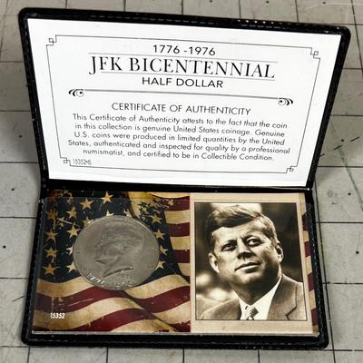 Bicentennial JF K Half Dollar With A COA in A presentation Case.