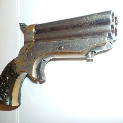 1860 Sharps 4 shot derriger 22 cal. rim fired pistol.