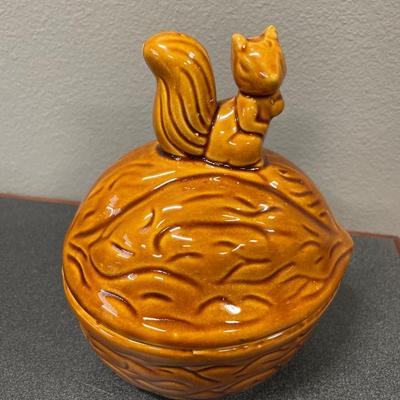 Squirrel on top of nut ceramic