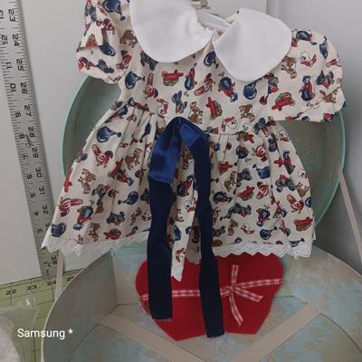 Decorative Box with Variety of Doll Clothes