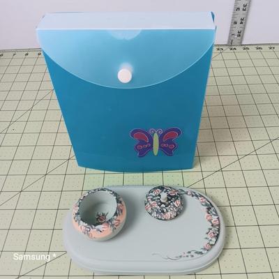 Plastic Filer and Painted Wood with attached Jar