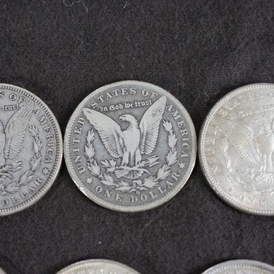 GROUPING OF SIX  MORGAN DOLLARS. 1870's and 1880's dates