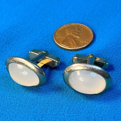 OPALESCENT OVALS IN GOLD TONE SETTING CUFF LINKS by ANSON