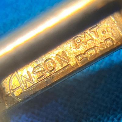 OPALESCENT OVALS IN GOLD TONE SETTING CUFF LINKS by ANSON
