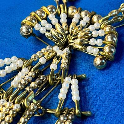 GOLD, WHITE SQUASH BLOSSOM NECKLACE MADE OF SAFETY PINS & BEADS