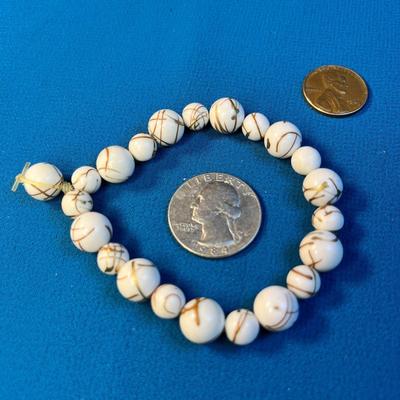 WHITE BEADS WITH GOLD ACCENT BRACELET