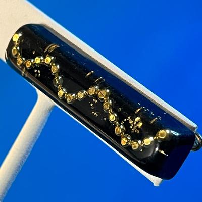 BLACK, GOLD BALL CHAIN EMBEDDED IN LUCITE-LIKE RESIN TIE CLIP