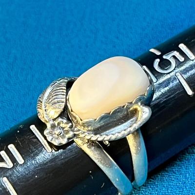 STERLING RING WITH MOTHER OF PEARL INSET AND SCULPTED BAND