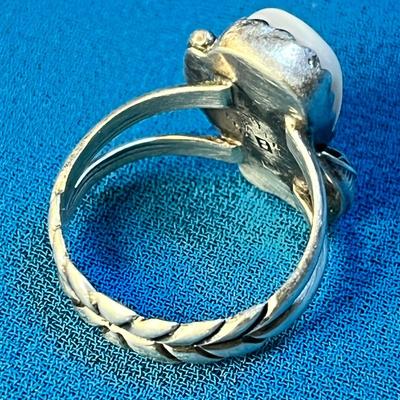 STERLING RING WITH MOTHER OF PEARL INSET AND SCULPTED BAND