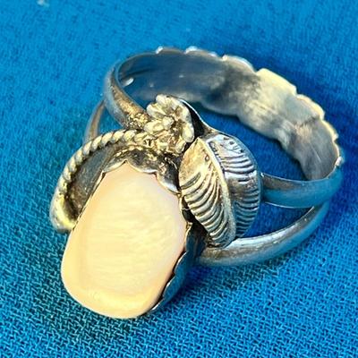 STERLING RING WITH MOTHER OF PEARL INSET AND SCULPTED BAND