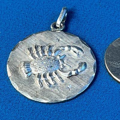 LIKELY STERLING ZODIAK PENDANT CANCER THE CRAB ON FRONT, ALL SYMBOLS ON BACK