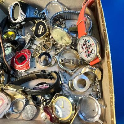 BOX FULL OF JUNQUE WATCHES, PARTS AND PIECES