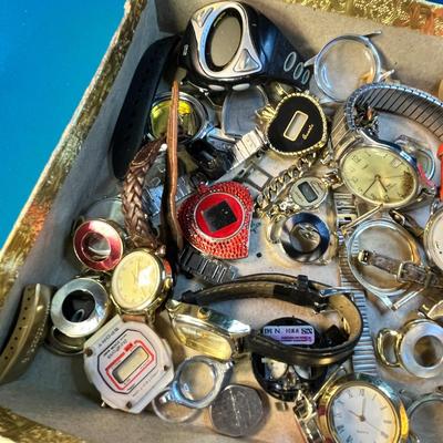 BOX FULL OF JUNQUE WATCHES, PARTS AND PIECES
