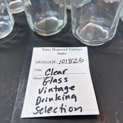 Clear glass drinking glasses ases, and wine goblets