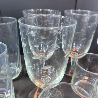 Clear glass drinking glasses ases, and wine goblets