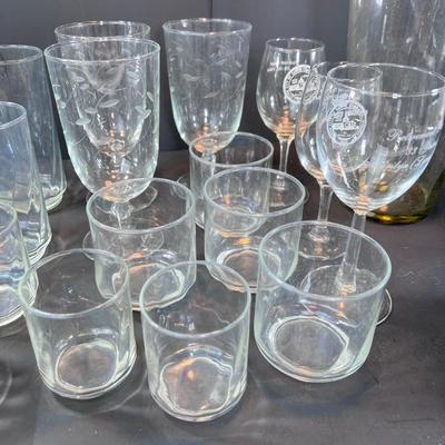 Clear glass drinking glasses ases, and wine goblets