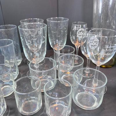 Clear glass drinking glasses ases, and wine goblets