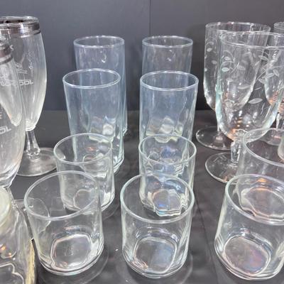 Clear glass drinking glasses ases, and wine goblets