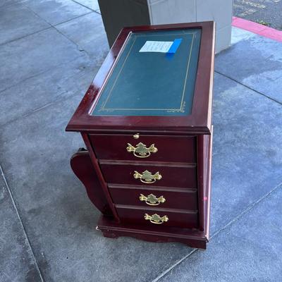 2 sided glame cabinet with leather top, small pull out writing are