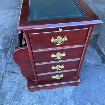 2 sided glame cabinet with leather top, small pull out writing are