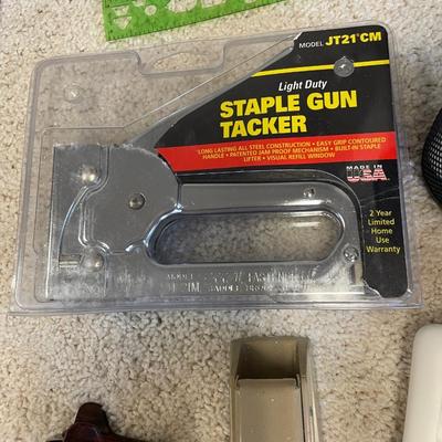 Stapler and magnifying glasses