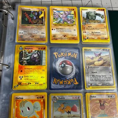 Collection of Vintage PokÃ©mon Cards In Sleeves in a Binder