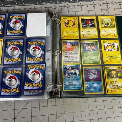Collection of Vintage PokÃ©mon Cards In Sleeves in a Binder