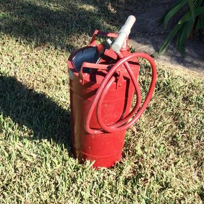 Vintage hand pump fire extinguisher holds 4 gallons