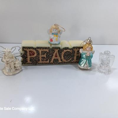 Little Angel figures ornaments and an Avon Peace candle