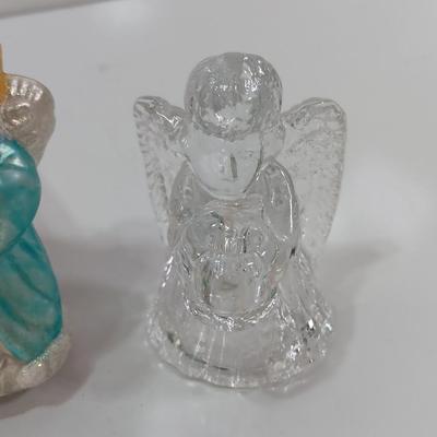Little Angel figures ornaments and an Avon Peace candle