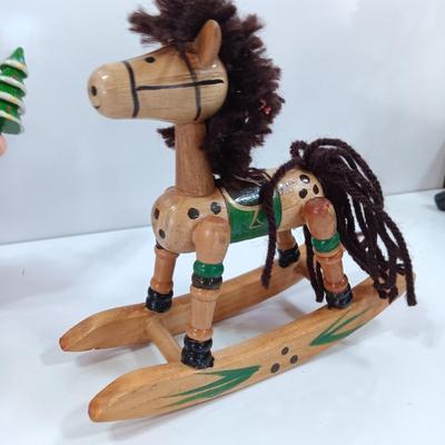 Two wooden ornaments - vintage Posable Santa and a rocking horse