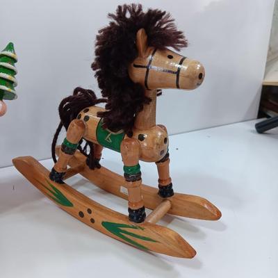 Two wooden ornaments - vintage Posable Santa and a rocking horse
