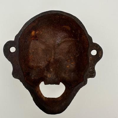 Cast Iron 4 Eyed Bottle Opener
