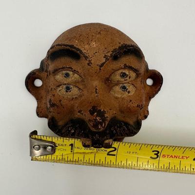 Cast Iron 4 Eyed Bottle Opener