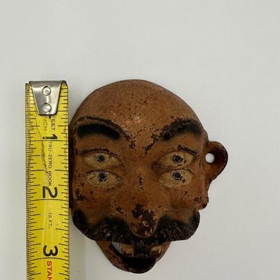 Cast Iron 4 Eyed Bottle Opener