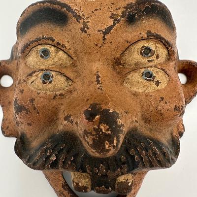 Cast Iron 4 Eyed Bottle Opener