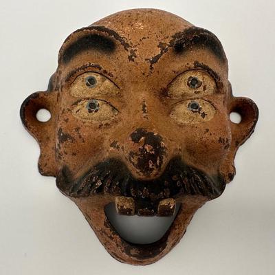 Cast Iron 4 Eyed Bottle Opener