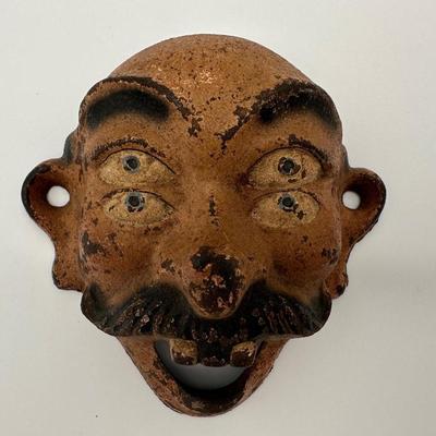 Cast Iron 4 Eyed Bottle Opener