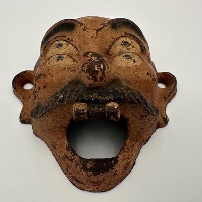 Cast Iron 4 Eyed Bottle Opener