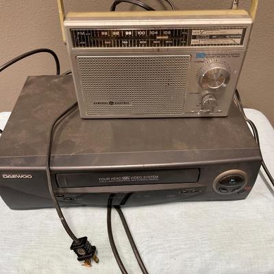 GE AM/FM radio and Daewoo VHS player.