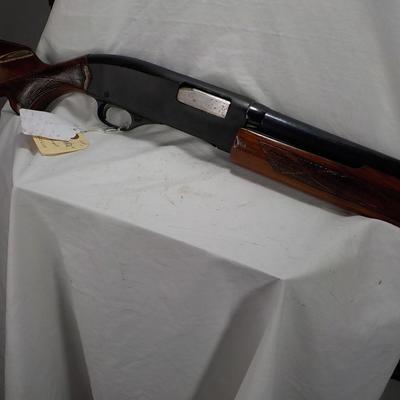 Winchester Model 1200 pump  12 gauge shot gun. est. $300 to $600.