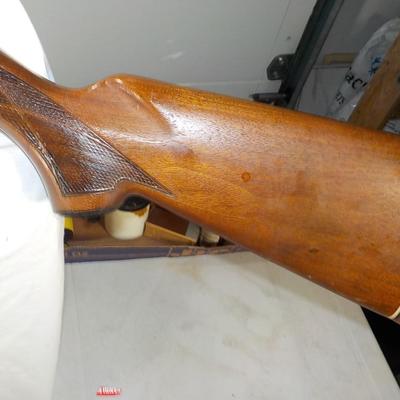 Winchester Model 1200 pump  12 gauge shot gun. est. $300 to $600.