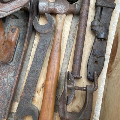 Antique tools with wooden crate