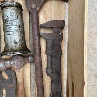 Antique tools with wooden crate