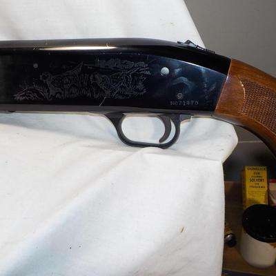 Revelation 12 gauge pump Shotgun (Mossberg) 2 3/4 & 3in shells. est $200 to $400.