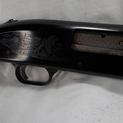 Revelation 12 gauge pump Shotgun (Mossberg) 2 3/4 & 3in shells. est $200 to $400.