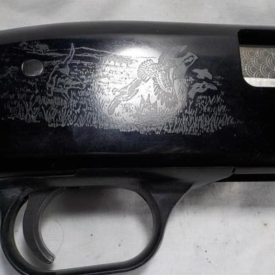 Revelation 12 gauge pump Shotgun (Mossberg) 2 3/4 & 3in shells. est $200 to $400.