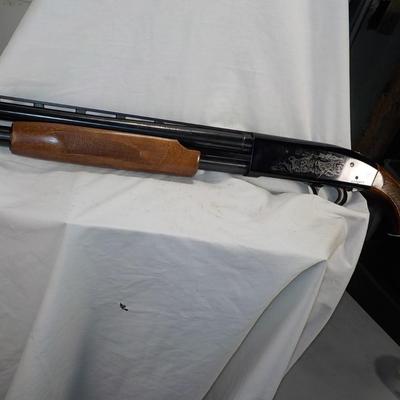 Revelation 12 gauge pump Shotgun (Mossberg) 2 3/4 & 3in shells. est $200 to $400.